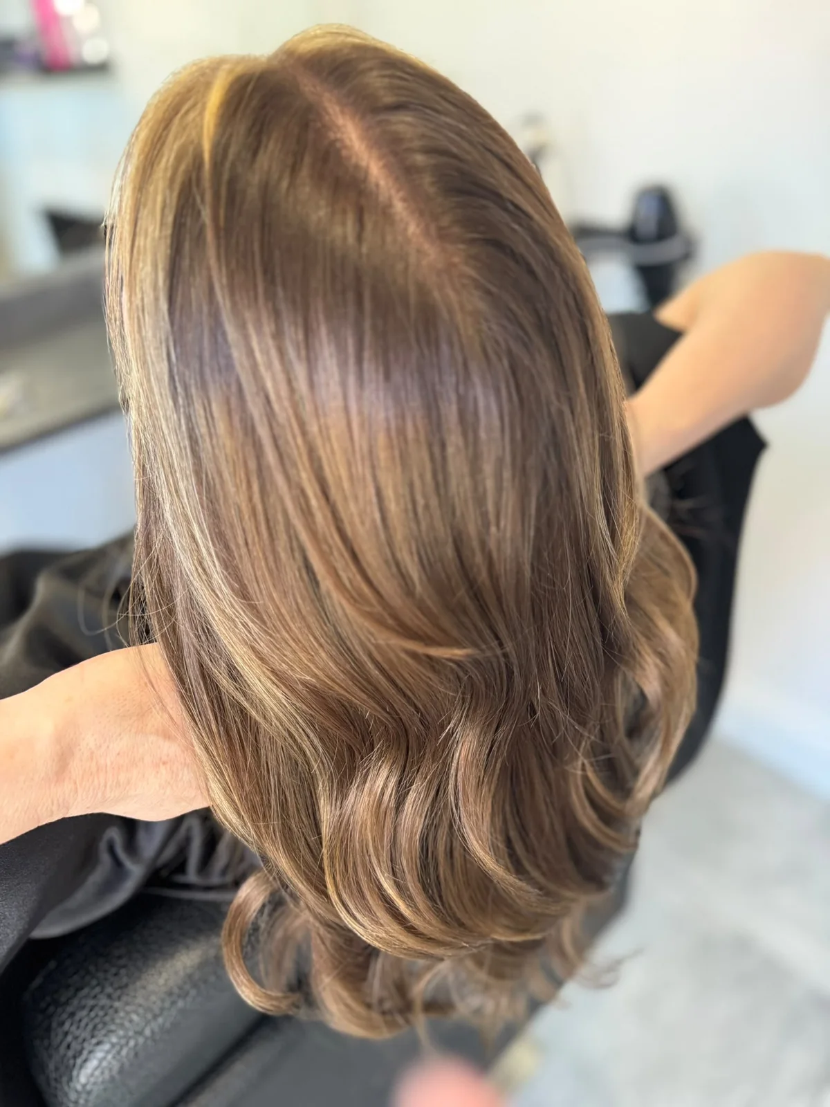 Soft brunette waves with subtle highlights, created by Lois